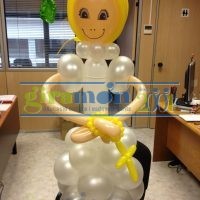 Figura niña comunión con globos